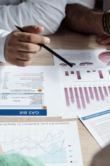 group of financial specialists sitting at table