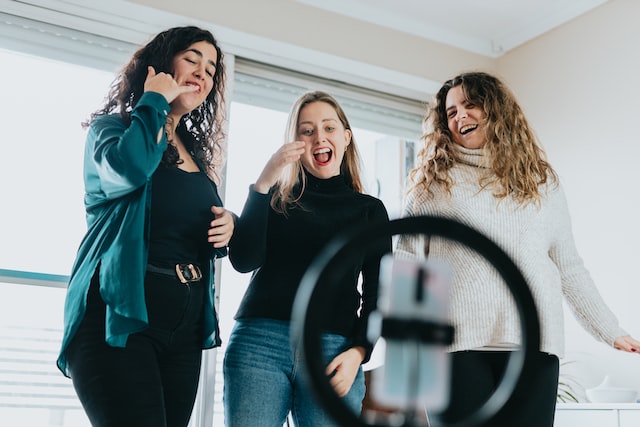 group of women standing next to each other