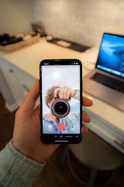 person holding black smartphone